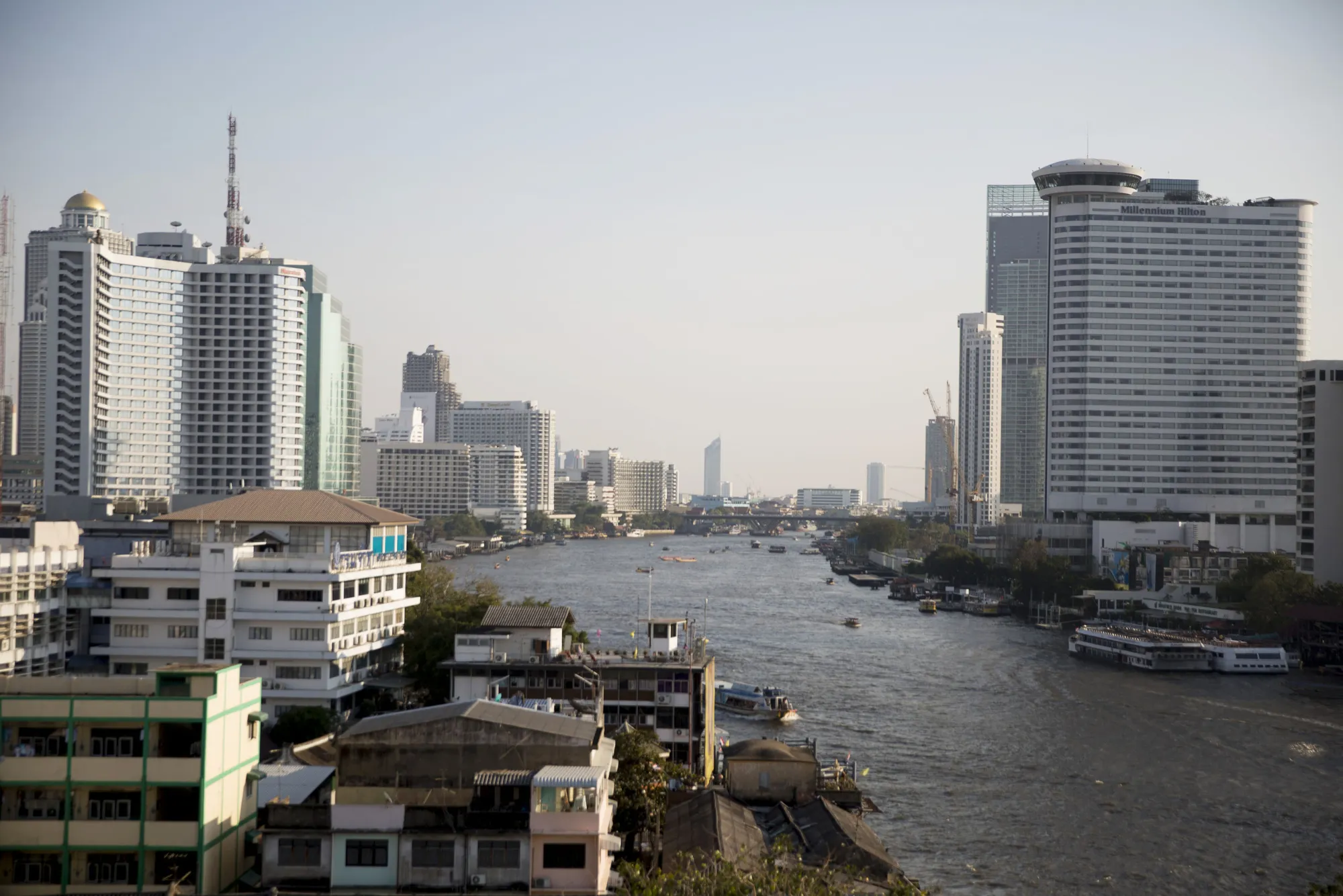 Life And Commerce Along The Chao Phraya River Ahead of Fourth-Quarter GDP Figures
