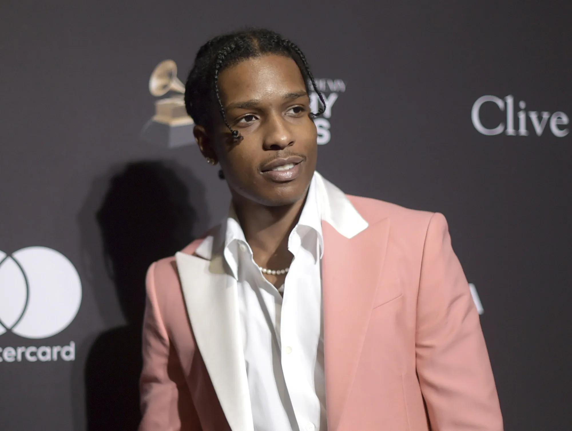A$AP Rocky attends the Pre-Grammy Gala And Salute To Industry Icons on Feb. 9, 2019 in Beverly Hills, Calif.   A$AP Rocky was taken into custody Wednesday, April 20, 2022 at Los Angeles International Airport in connection with a shooting in Hollywood last year, authorities said. The performer, whose real name is Rakim Mayers, was detained on suspicion of assault with a deadly weapon, the Los Angeles Police Department said in a statement Wednesday.(Photo by Richard Shotwell/Invision/AP, File)