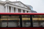 A bus passes the Bank of England.