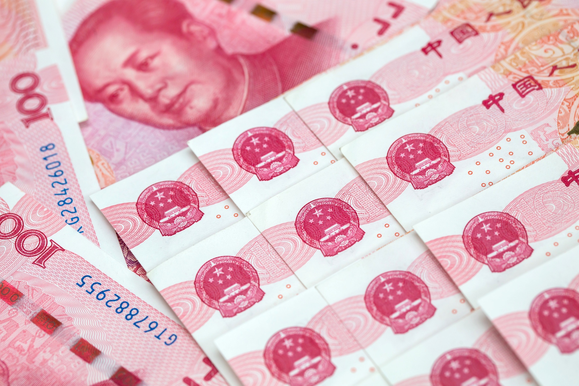Hong Kong Dollar, Chinese Yuan and US Dollar Banknotes As Currency Peg Intervention From HKMA Continues Into Third Day