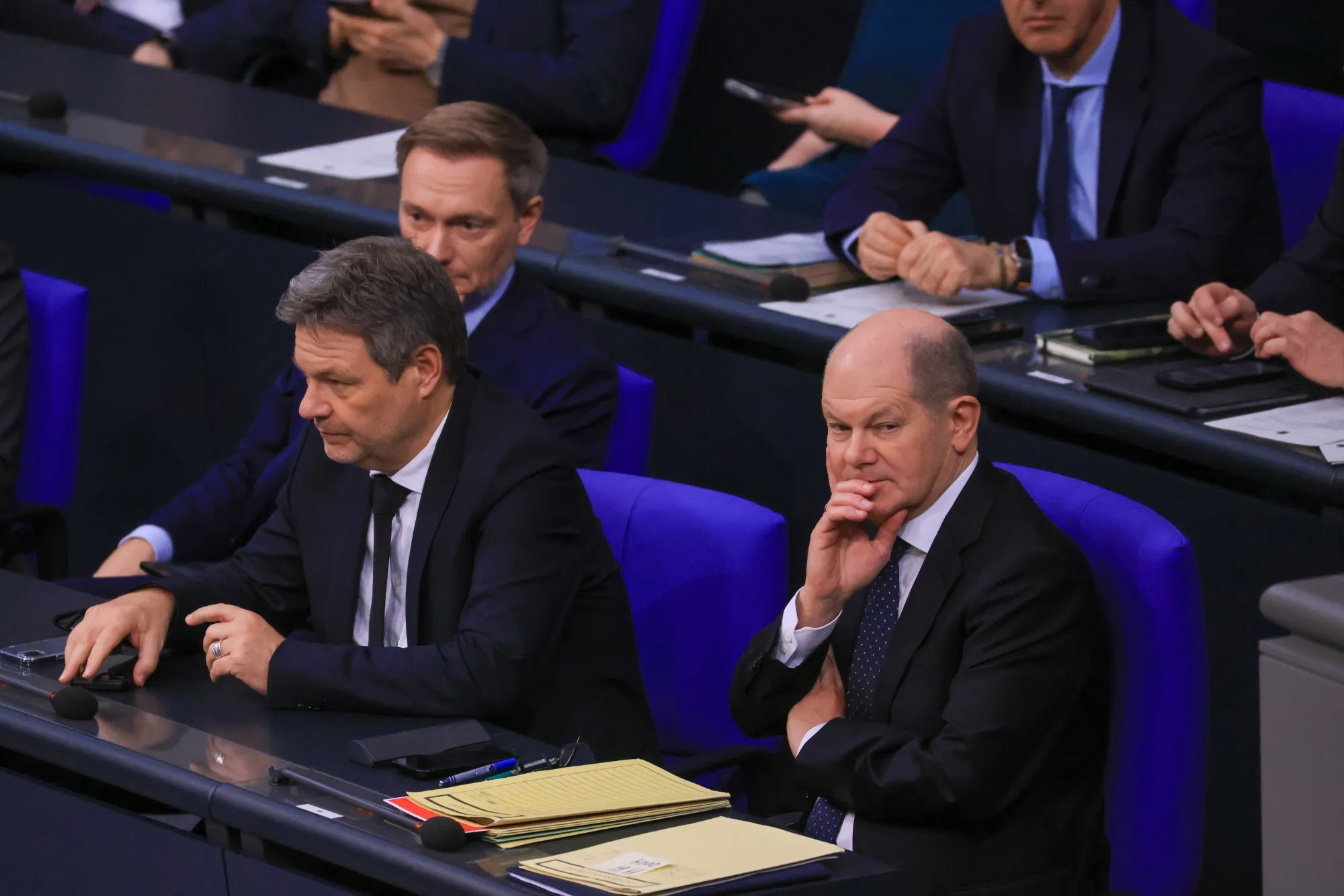 Christian Lindner, Robert Habeck, and Olaf Scholz, at the Bundestag in Berlin, Dec. 13.