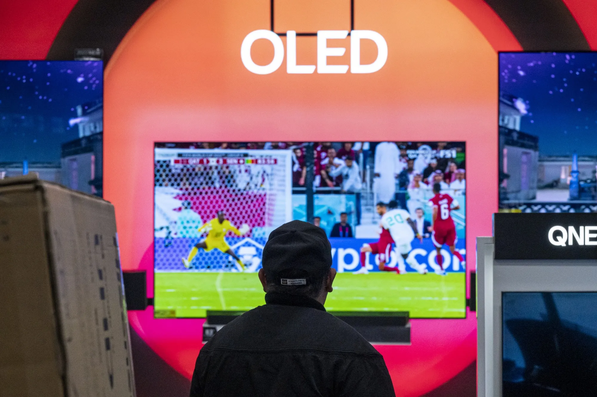 A shopper browses televisions at a store&nbsp;in San Francisco.