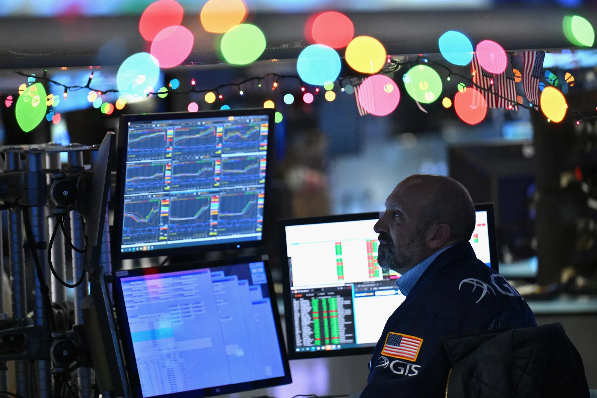 A trader works on the floor of the New York Stock Exchange.
