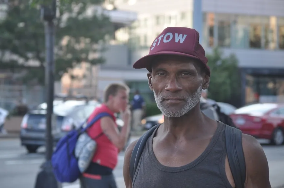  Gwendel Wilson often sleeps on a dusty strip of grass on "Methadone Mile." "They have everything right here," he says.
