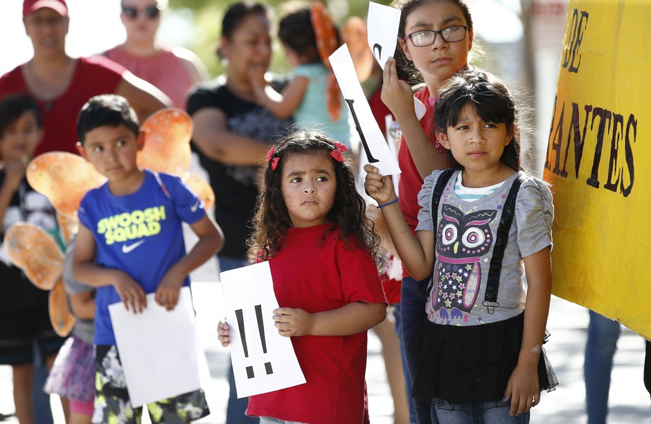 Children at a protest against the government's family separation policy in Phoenix.