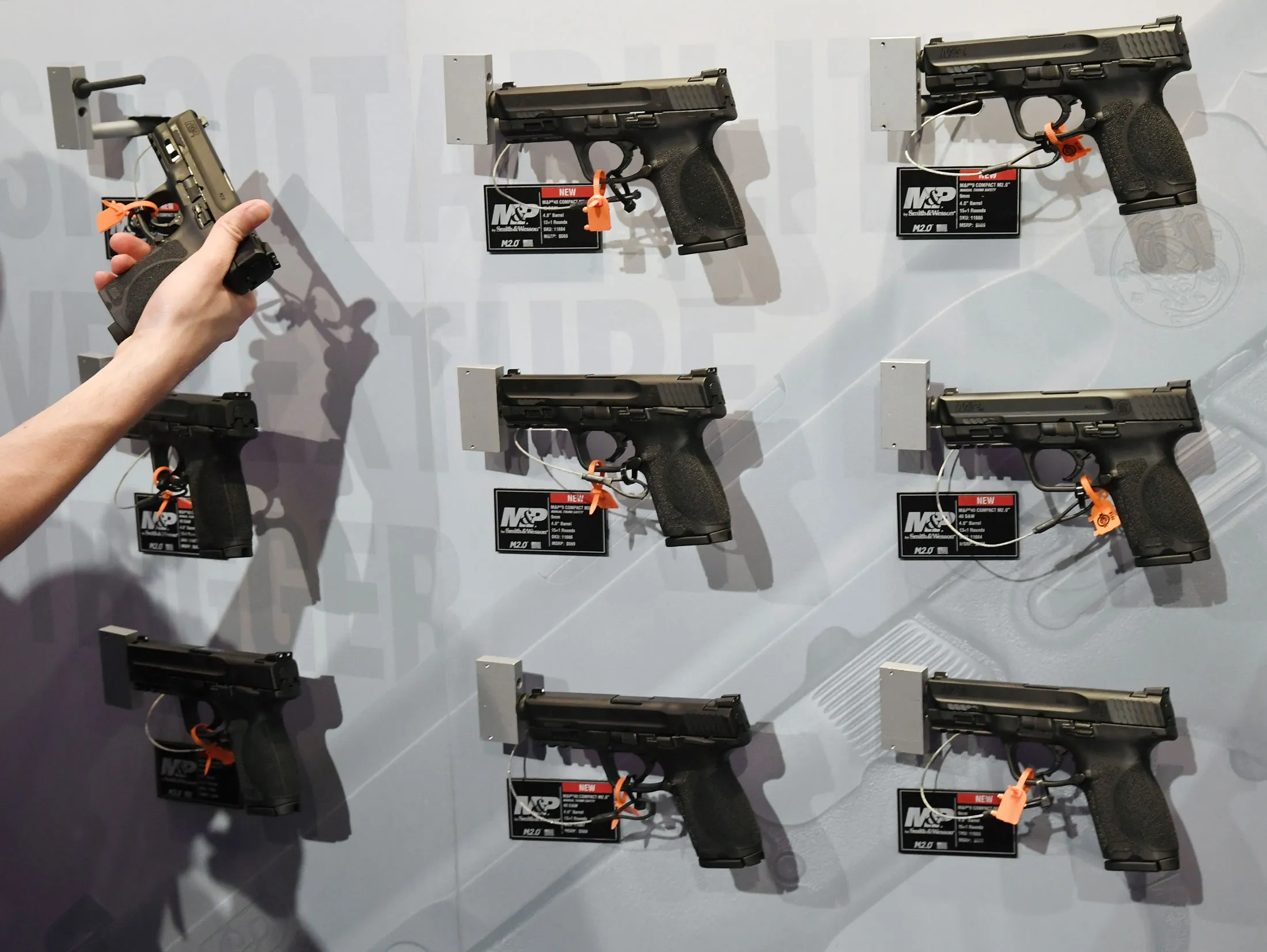 Handguns are displayed at the Smith &amp; Wesson booth at the 2018 National Shooting Sports Foundation's Shooting, Hunting, Outdoor Trade (SHOT) Show at the Sands Expo and Convention Center on January 23, 2018 in Las Vegas, Nevada.&nbsp;&nbsp;