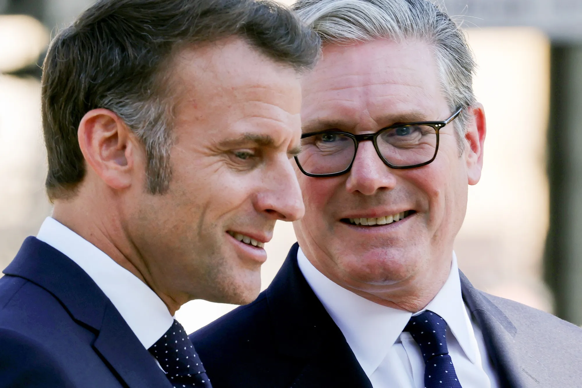 French President Emmanuel Macron,&nbsp;left, and UK Prime Minister Keir Starmer&nbsp;in Parliament Square in London on Tuesday.