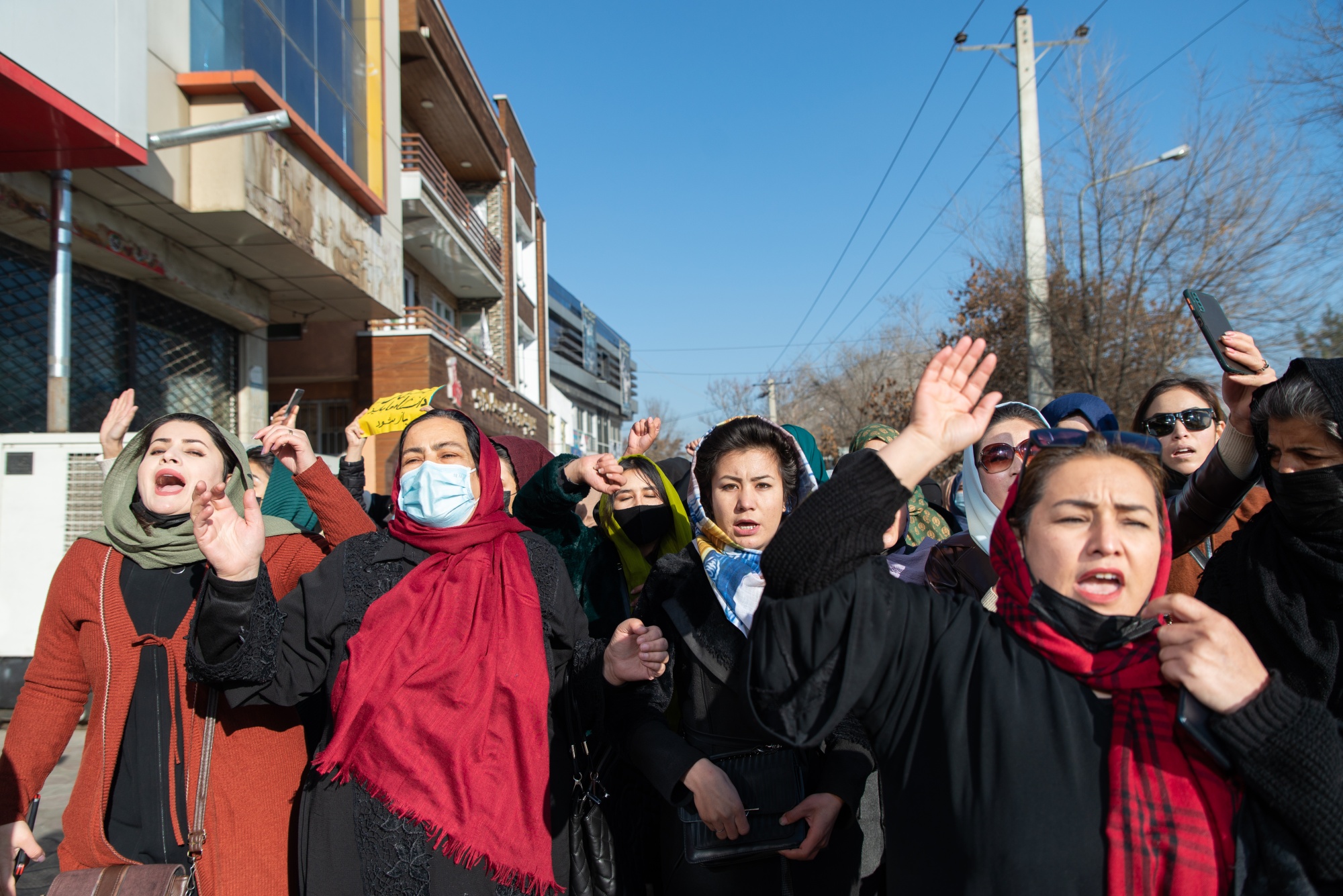 Afghan women protest against new Taliban ban on women accessing University Education in Kabul on Dec. 22.