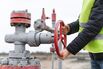 Stationary or technical unrecognizable engineer turning on off vent of gas pump