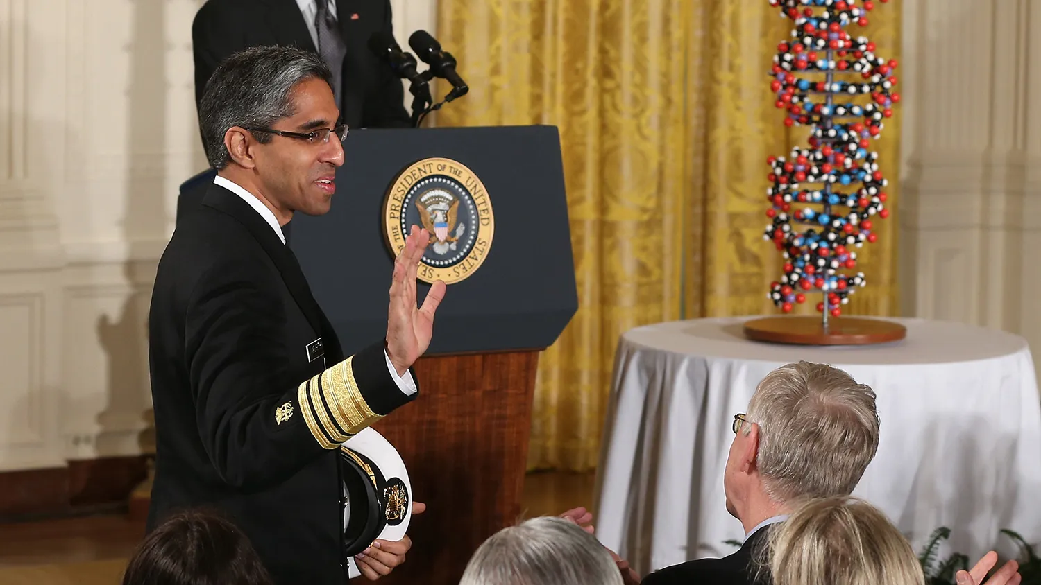 WASHINGTON, DC - JANUARY 30: US President Barack Obama introduces Surgeon General Vivek Hallegere Murthy during an event in the East Room at the White House, January 30, 2015 in Washington, DC. President Obama hosted the event to highlight investments that improve health and treat disease through precision medicine.

