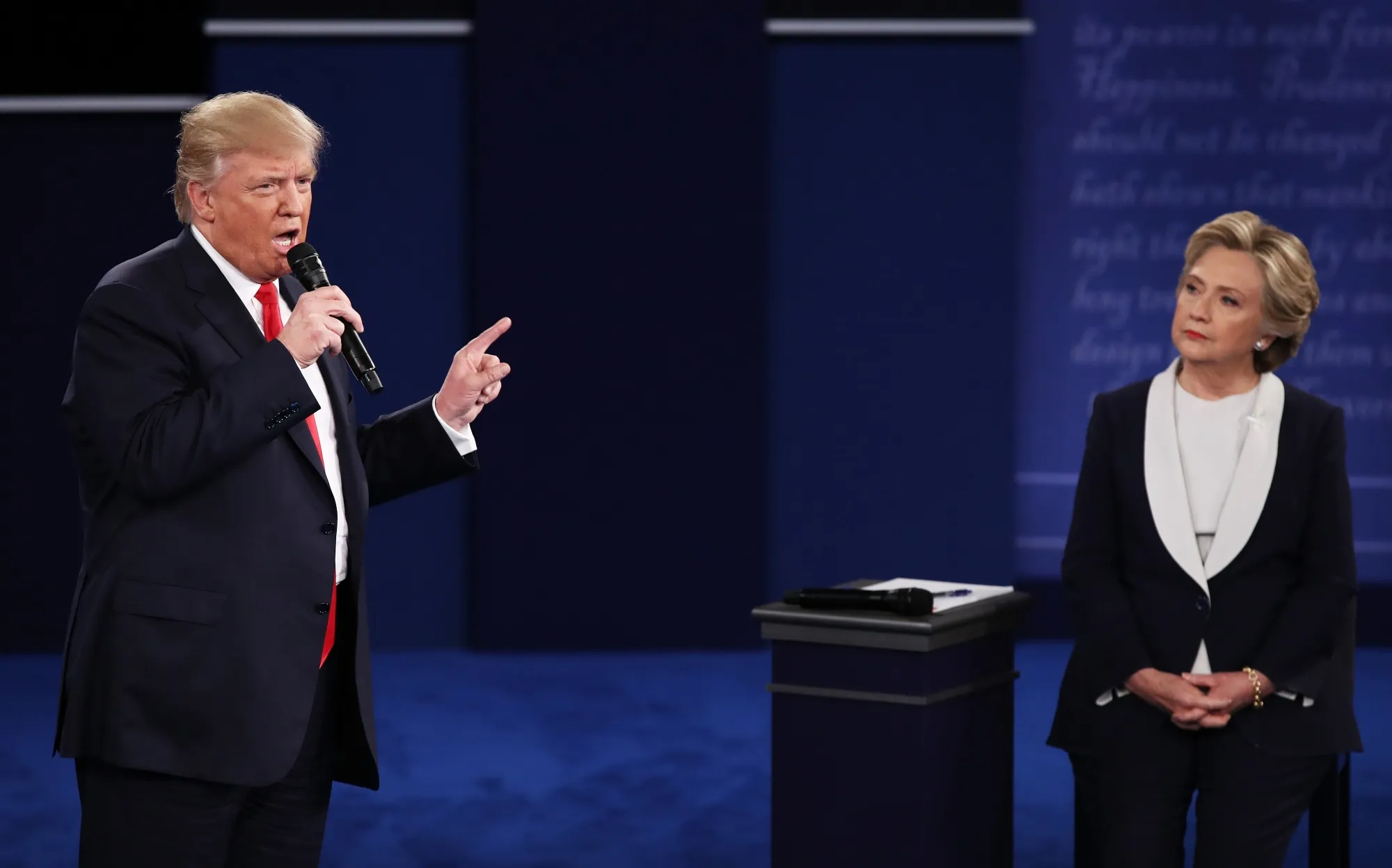 Donald Trump and Hillary Clinton during a town hall debate at Washington University on Oct. 9, 2016 in St Louis, Missouri.