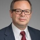 Headshot of Bruce G Chapman