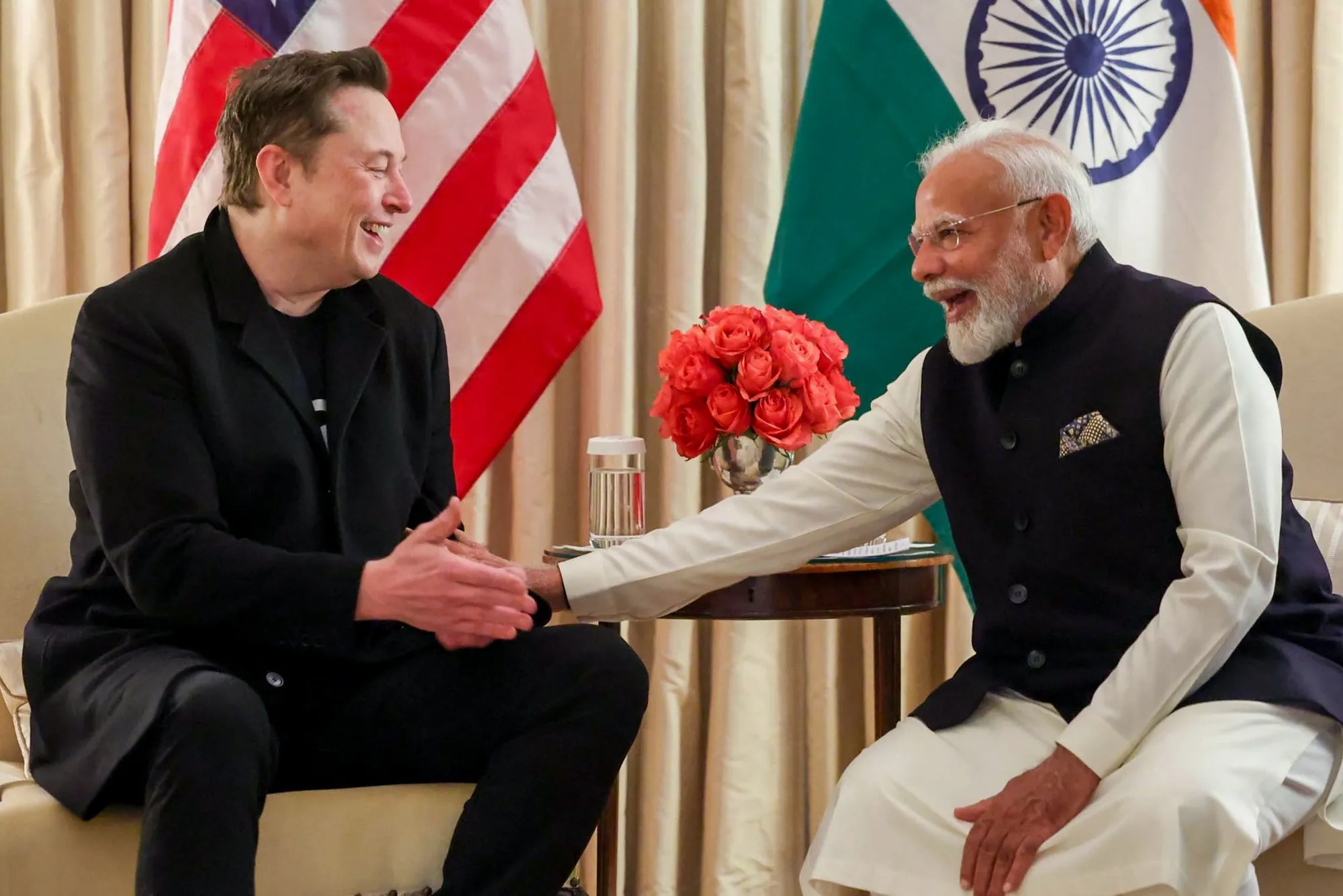Elon Musk, left, and Indian Prime Minister Narendra Modi shake hands during a meeting in Washington in February.
