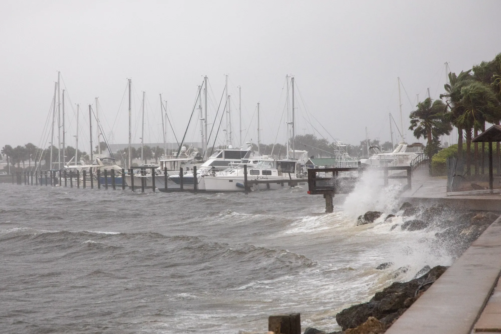 Waves crash into a seawall ahead of Hurricane Milton's expected landfall in St. Petersburg, Florida.