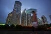 Commuters in the Pudong Business Area of Shanghai as Plenum Concludes