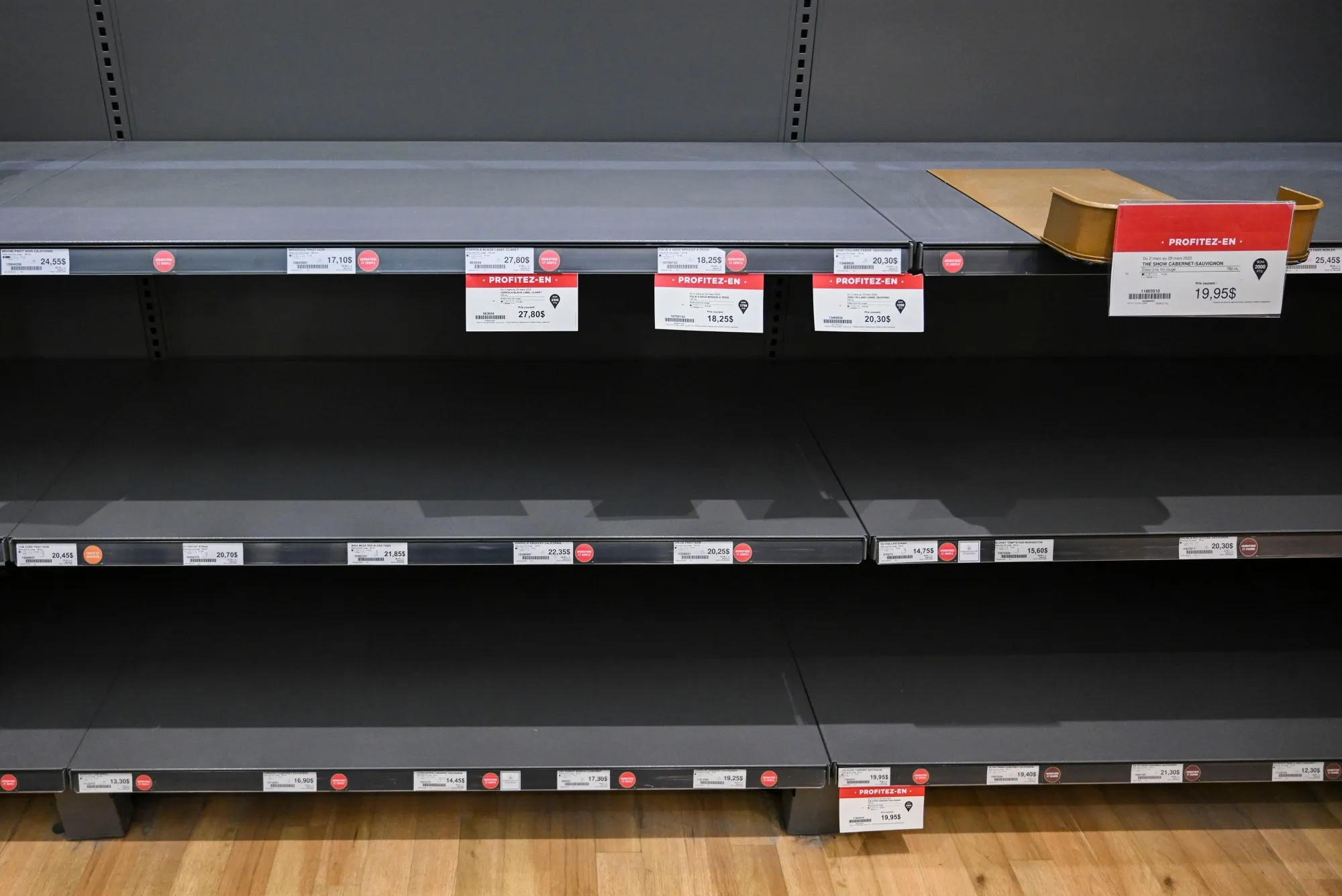 Empty space on a Quebec liquor store shelf where American-made wine once sat.