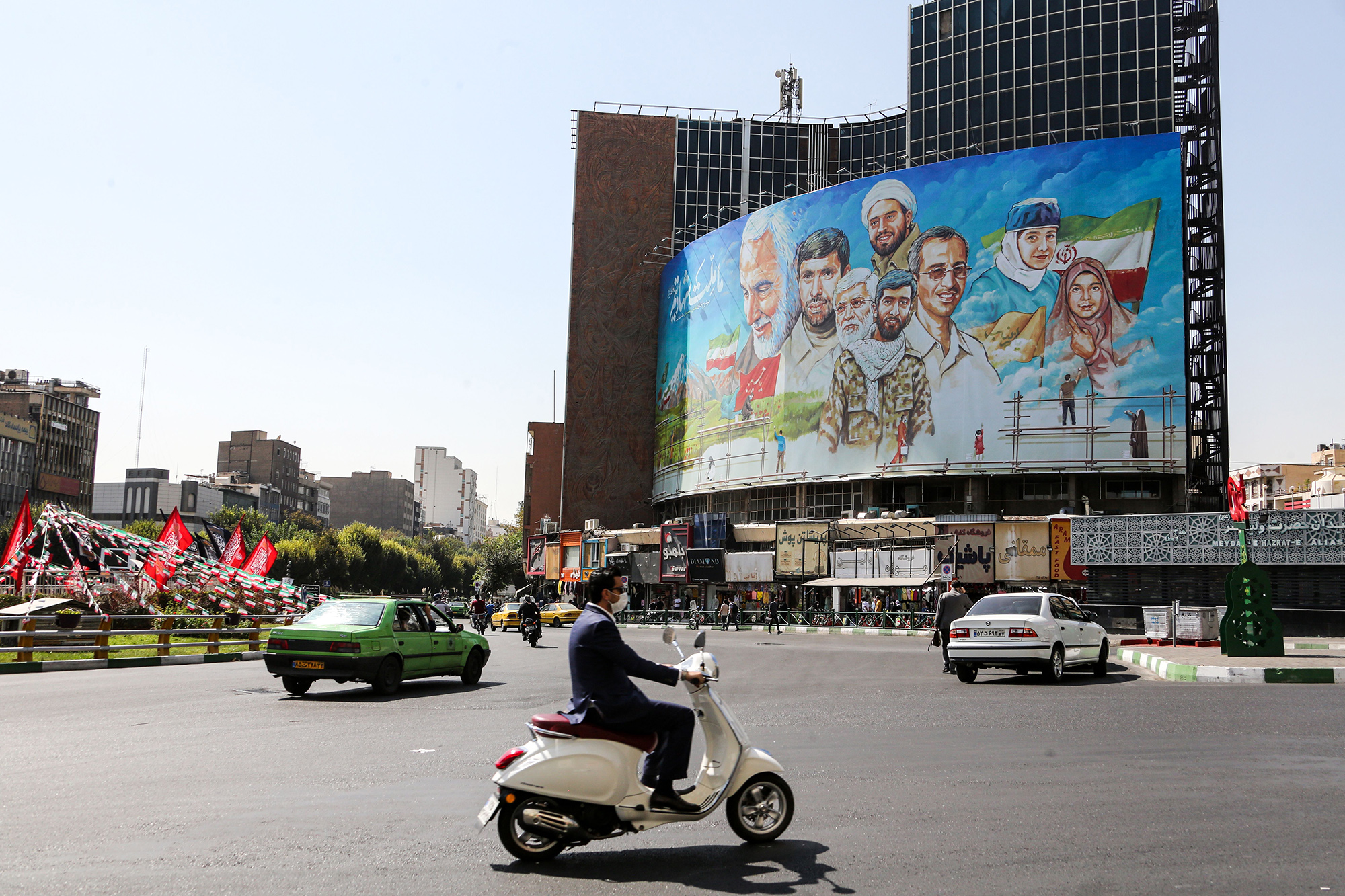 A man rides a scooter along Valiasr Square in&nbsp;Tehran on Sept.&nbsp;27.