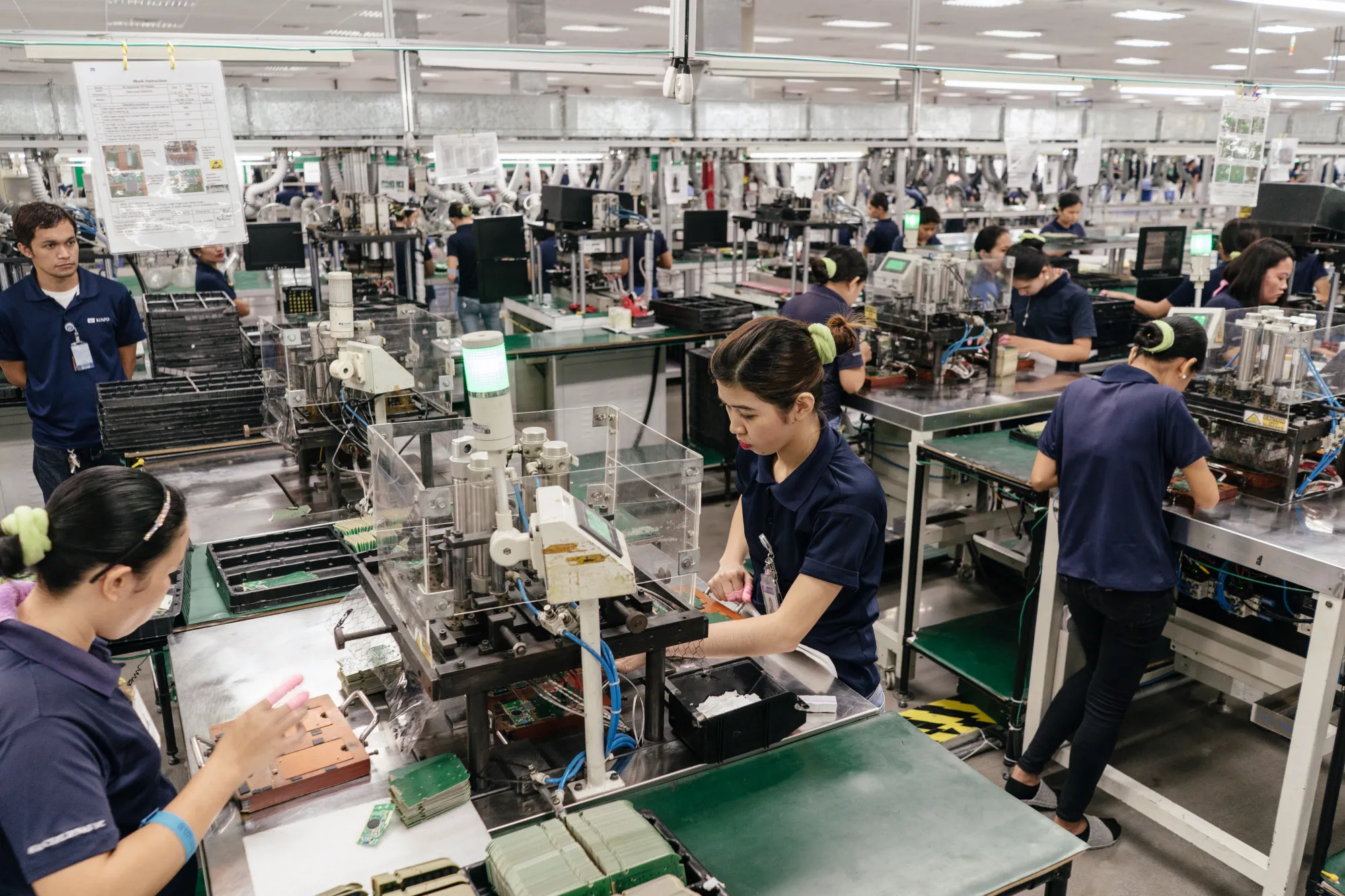 Manufacturing Calculators at a Cal-Comp Technology Factory as New Kinpo Group Philippine Unit Plans IPO 