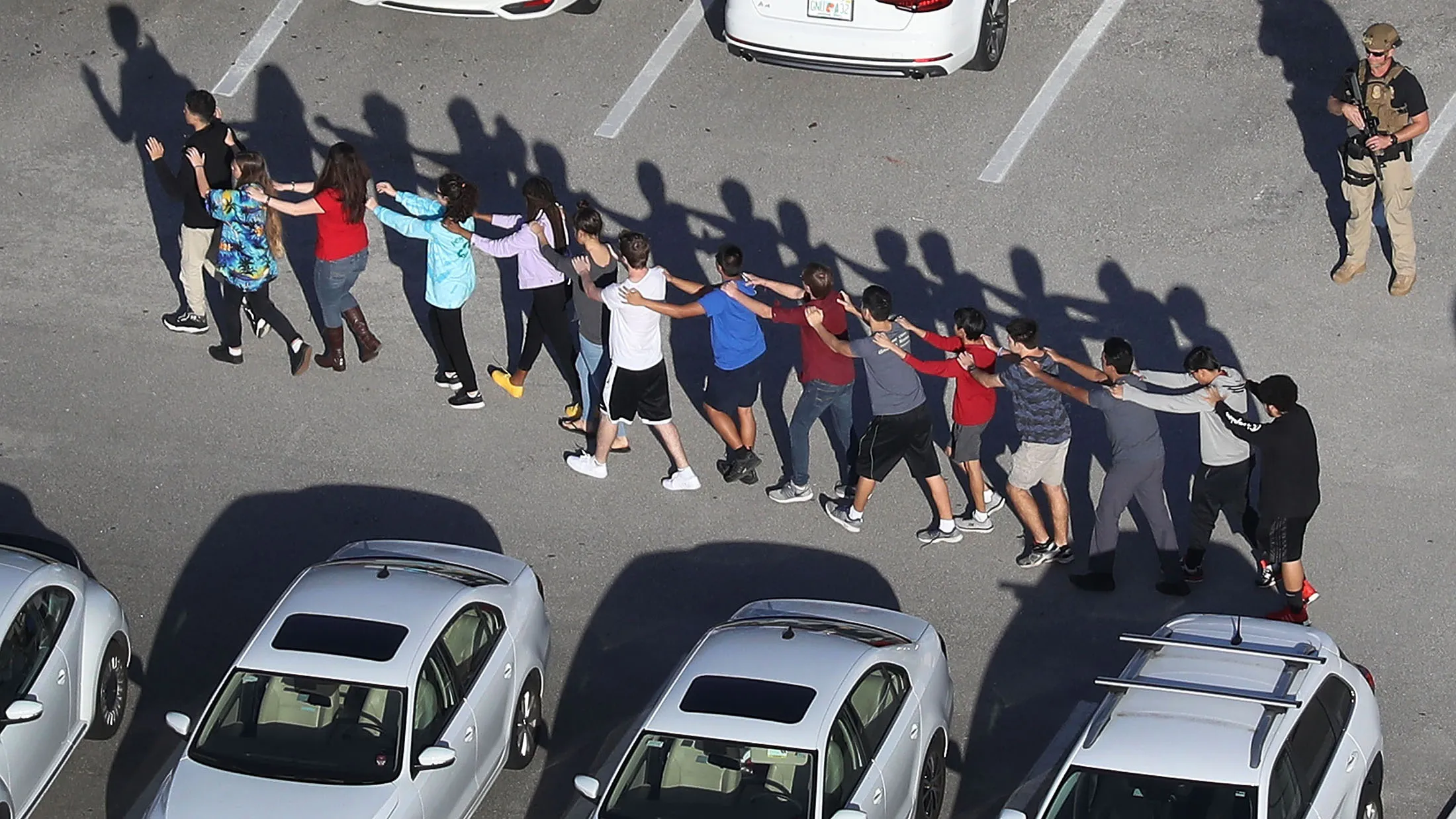 Florida Gunman Had Extra Ammo At School, Fired for 3 Minutes - Bloomberg