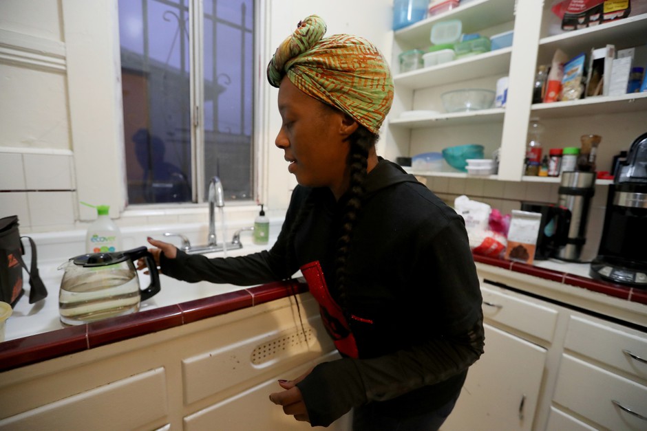 Dominque Walker, a founder of Moms 4 Housing, in the kitchen of the vacant house in West Oakland that the group occupied to draw attention to fair housing issues.