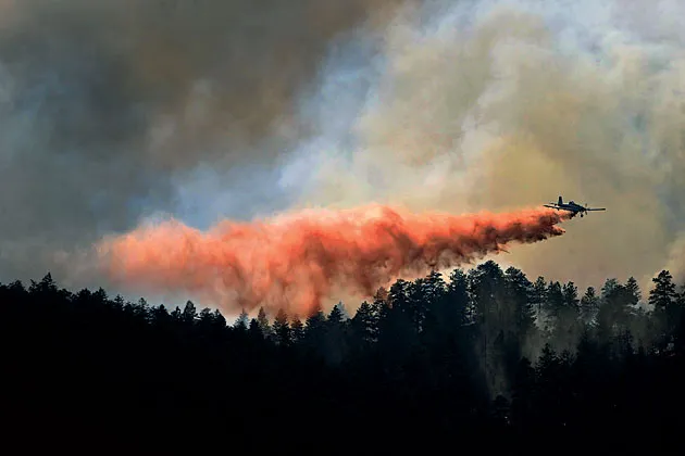 "You can put out a fire with no airplanes, but you can't put out a fire with only airplanes" — Tom Harbour, director of fire and aviation management, U.S. Forest Service