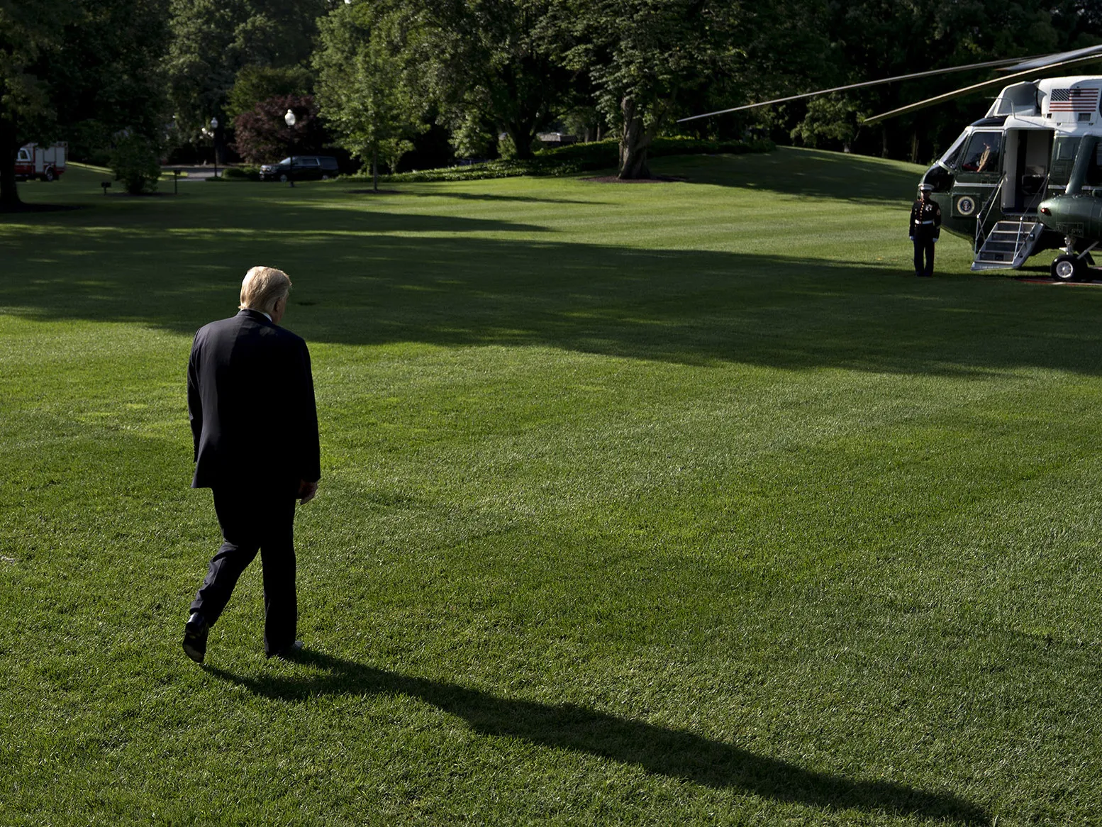 Trump walks on the South Lawn of the White House before boarding Marine One in Washington, D.C.