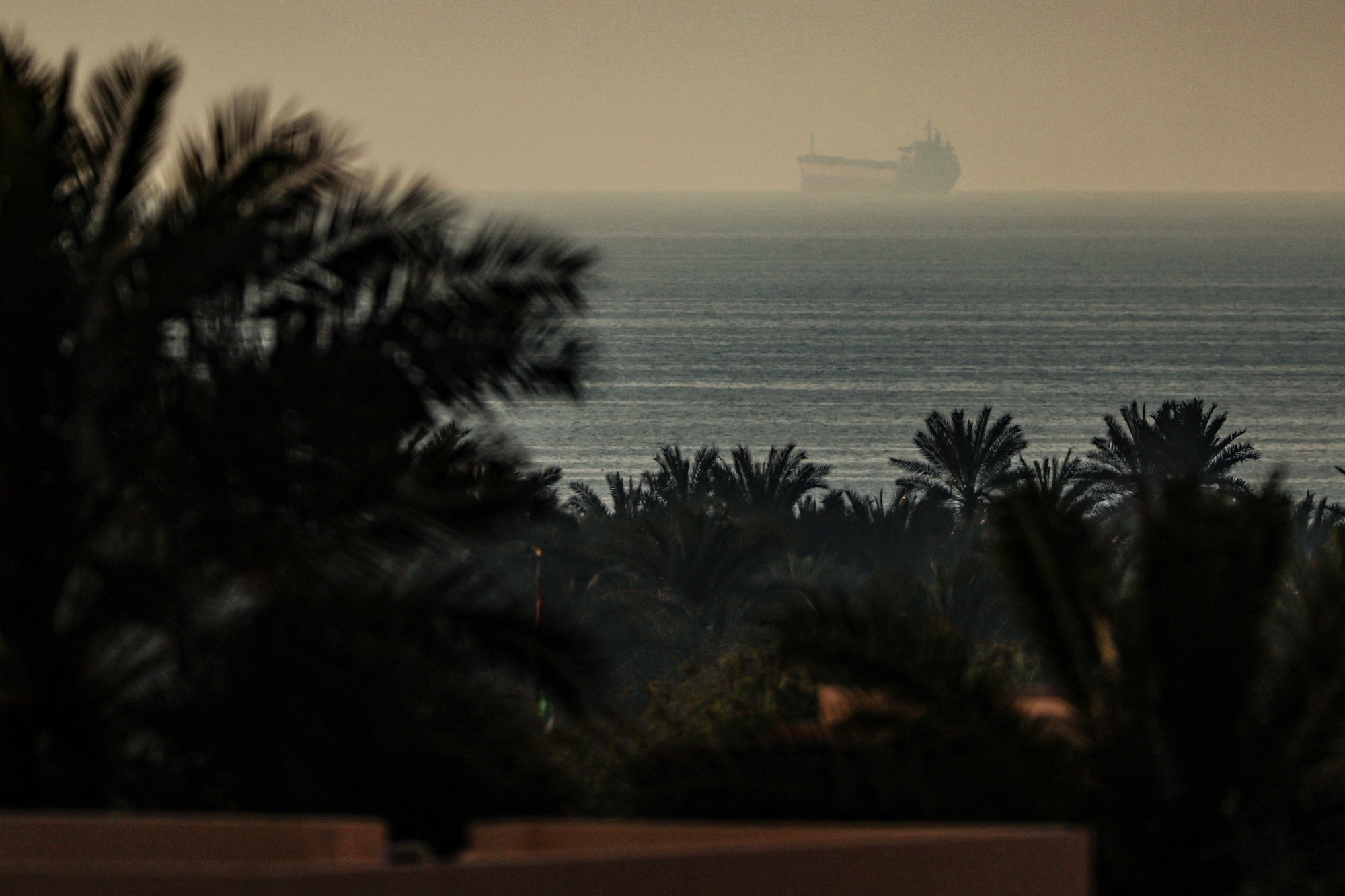 A tanker passes through the Strait of Hormuz. Photographer: Fadel Senna/AFP