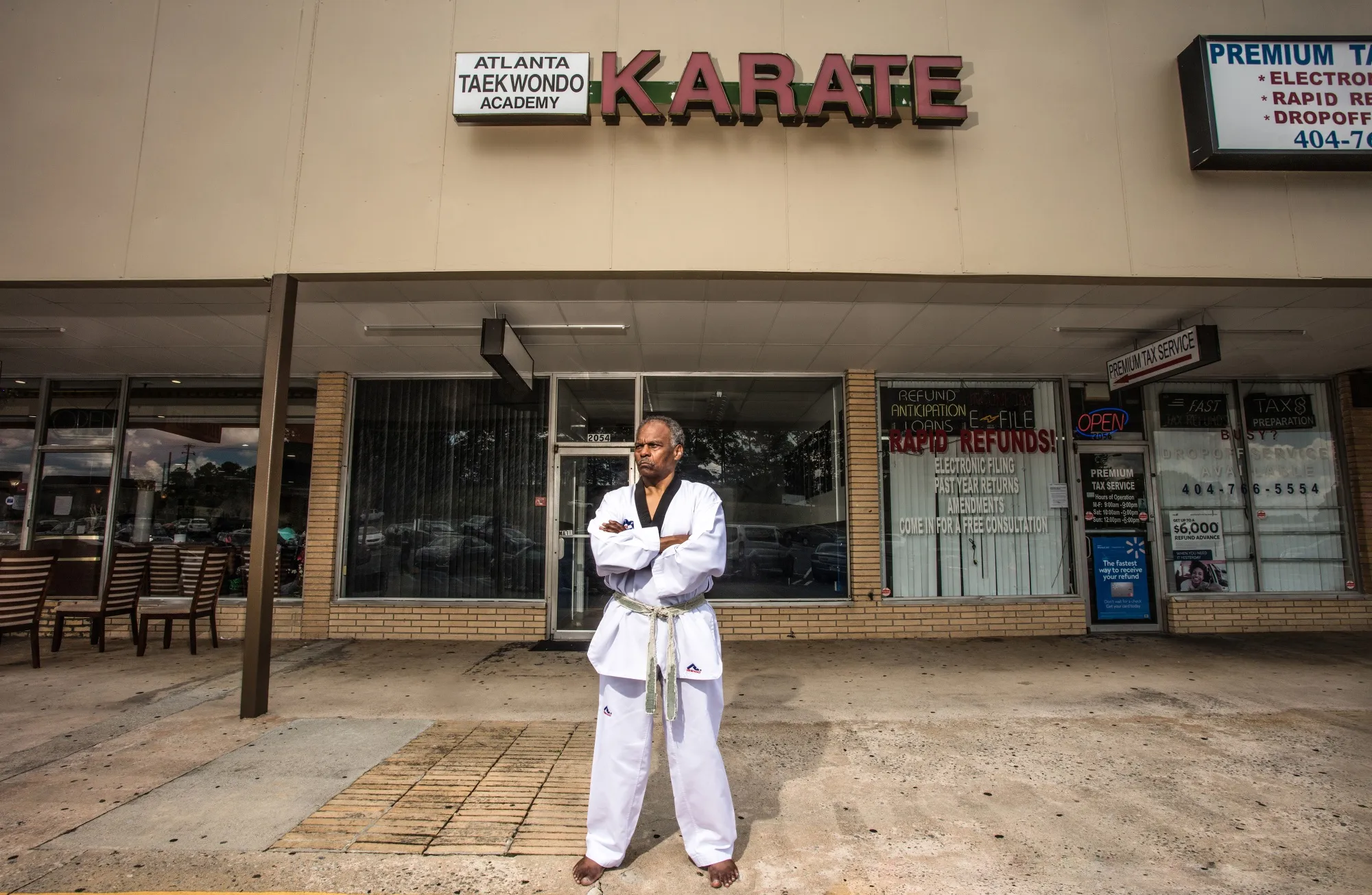 Isaac Thomas outside Atlanta Taekwondo Academy in East Point, on June 12.