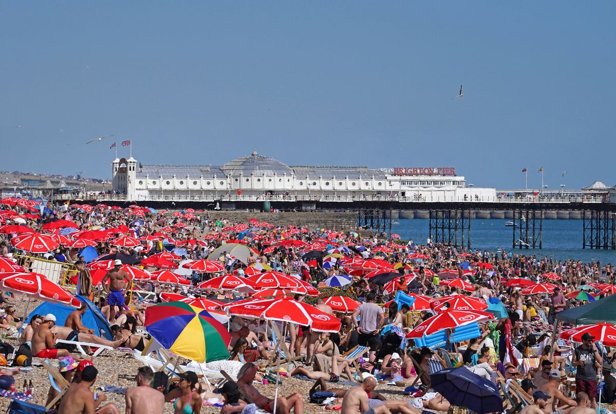 Brits Flock to Seaside Towns to Beat the Heat and Airport Chaos