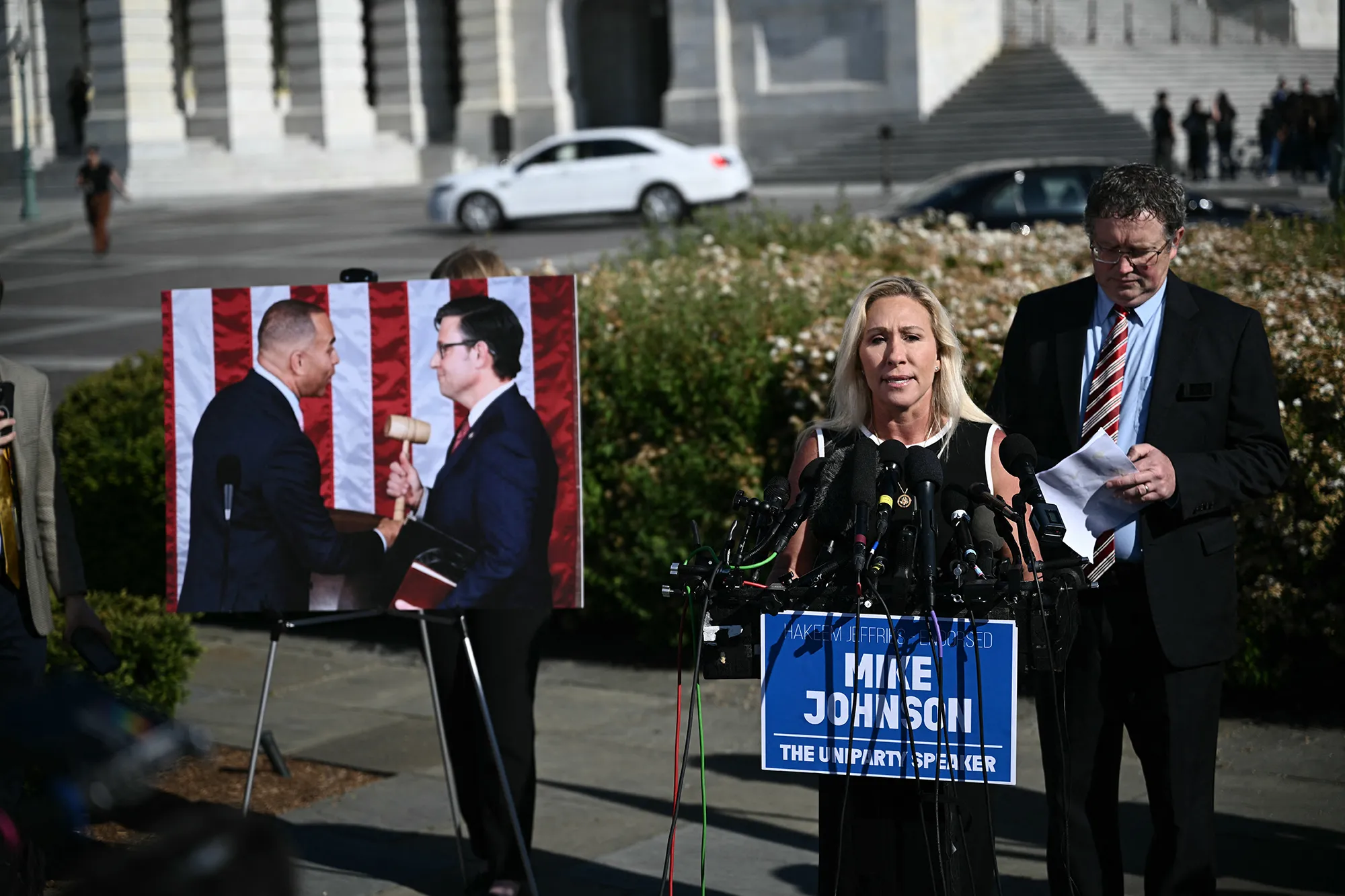 Marjorie Taylor Greene and Thomas Massie hold a press conference outside the US Capitol on May 1.