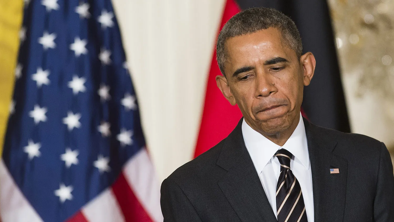 US President Barack Obama speaks during a joint press conference with German Chancellor Angela Merkel in the East Room of the White House in Washington, DC, February 9, 2015.
