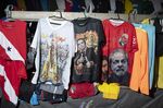 A vendor sells t-shirts in support of President Jair Boslonaro and his leftist challenger&nbsp;Luiz Inacio Lula da Silva during the Cirio de Nazare festival in Belem, capital of Para state, on&nbsp;Oct. 8.