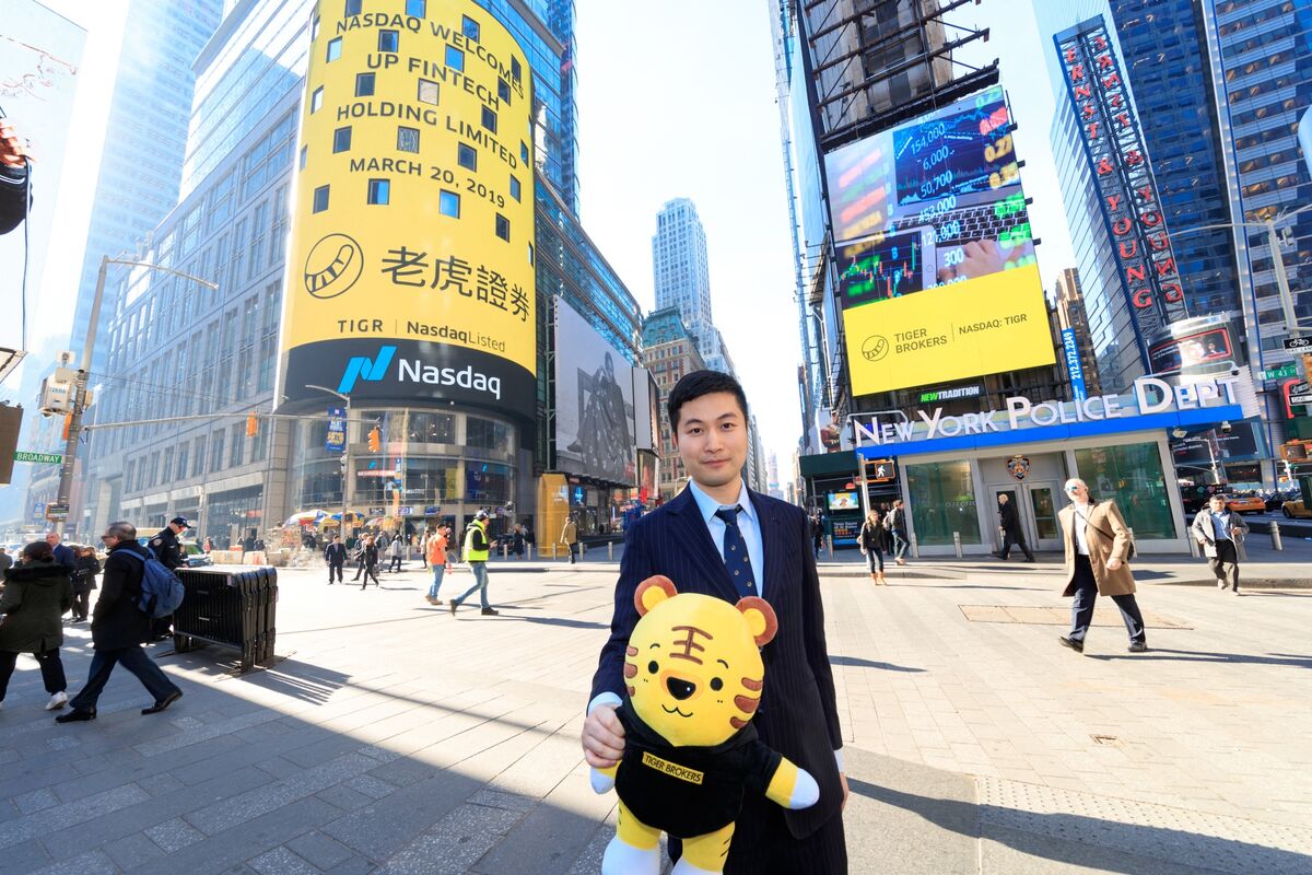 China to Penalize Tiger, Futu in Cross-Border Flow Crackdown