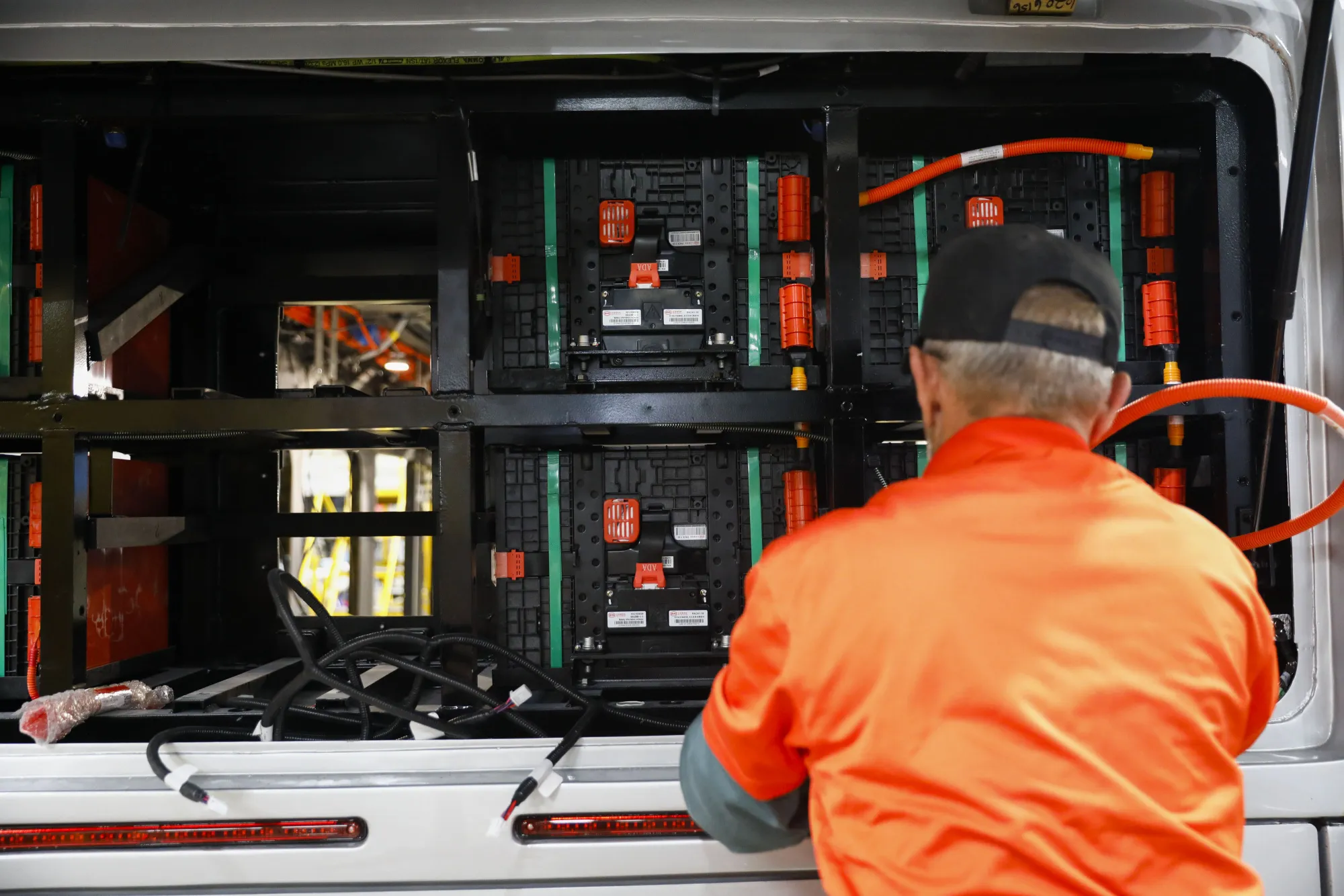 An employee installs the batteries of an electric bus&nbsp;in Lancaster, California.