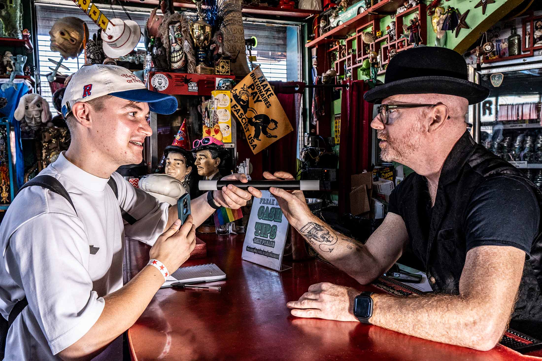 A contestant from team Q Train of Thought with magician Albert Cadabra in Coney Island.