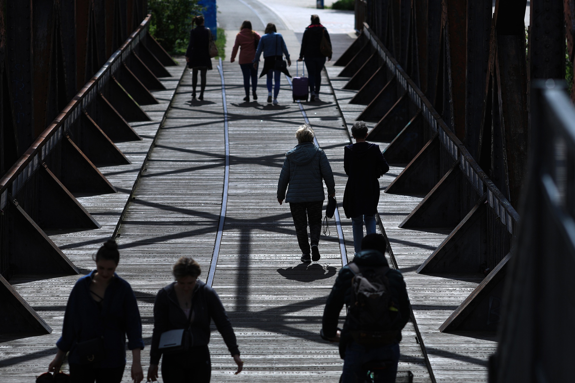Pedestrians cross Zollbruecke bridge in Magdeburg, Germany, on&nbsp;May 28.