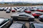 A Tesla Cybertruck and other Tesla vehicles parked at a logistics zone in Seattle.