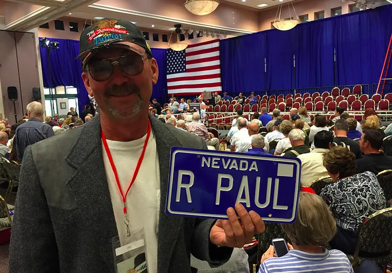 Pahrump, Nevada Republican Rich Bushart displays the license plate he got for his own car.
