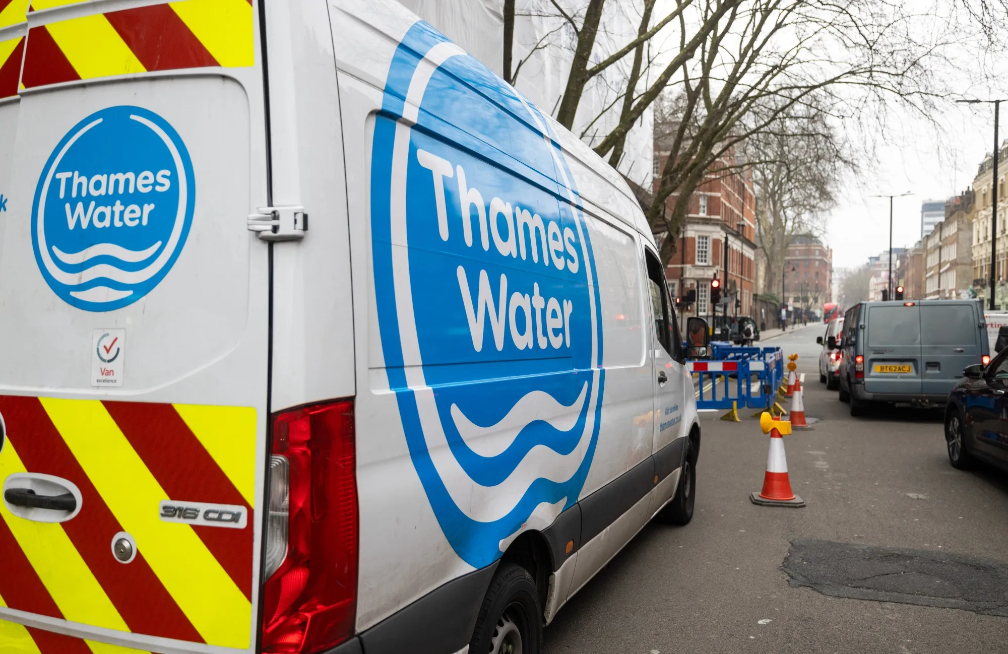 A Thames Water Ltd. van at a works location in London.