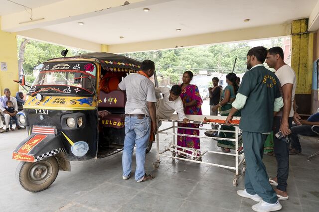 A man gets on to a stretcher at ANMMCH