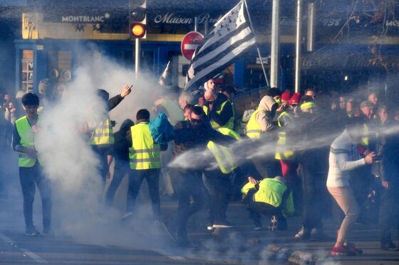 French Protests Sparked by Gas Tax Lead to 1 Death, 227 Injuries