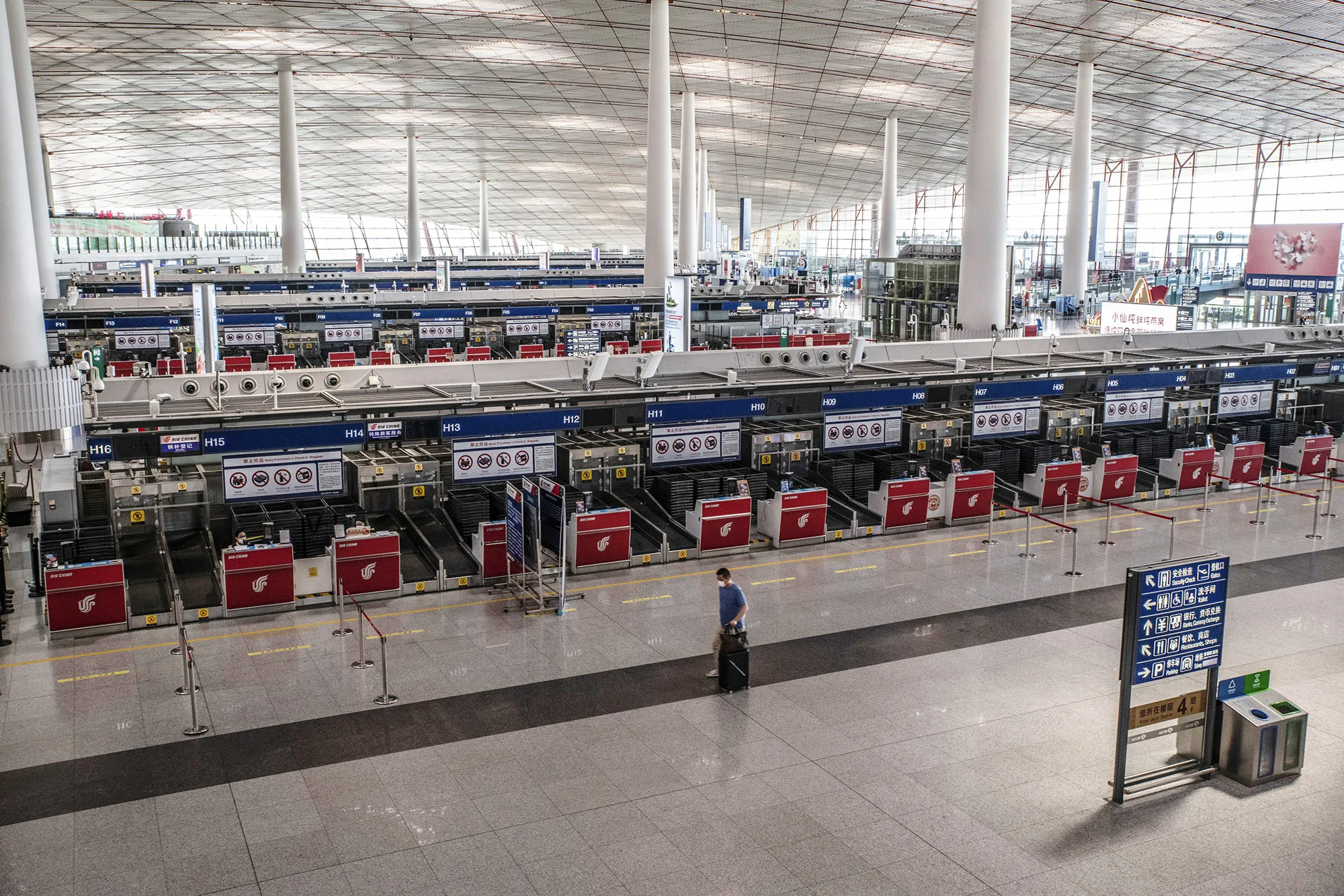 A deserted departure hall at Beijing Capital International Airport during travel and movement restrictions&nbsp;in Beijing, on&nbsp;Aug. 5.
