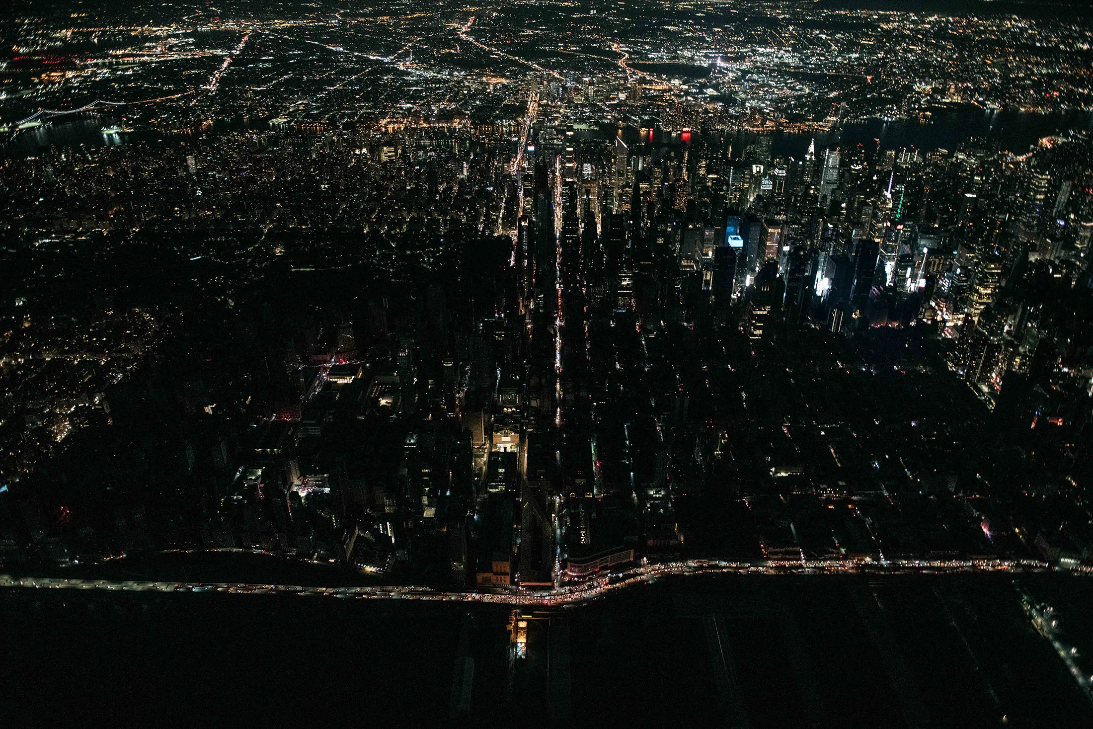 A large section of Manhattan’s Upper West Side and Midtown neighborhoods are seen in darkness in New York on July 13.
