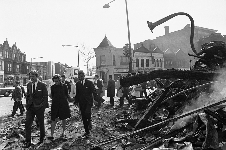 Rev. Walter E. Fauntroy (right) walks with Sen. Robert F. Kennedy and Ethel Kennedy as they tour 14th Street in the aftermath of the riots, April 7, 1968