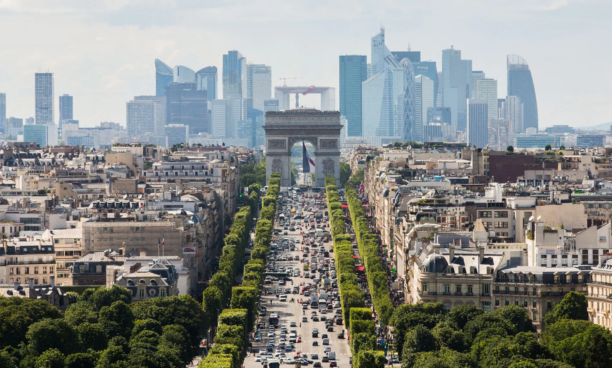 The Arc De Triomphe stands in Paris.
