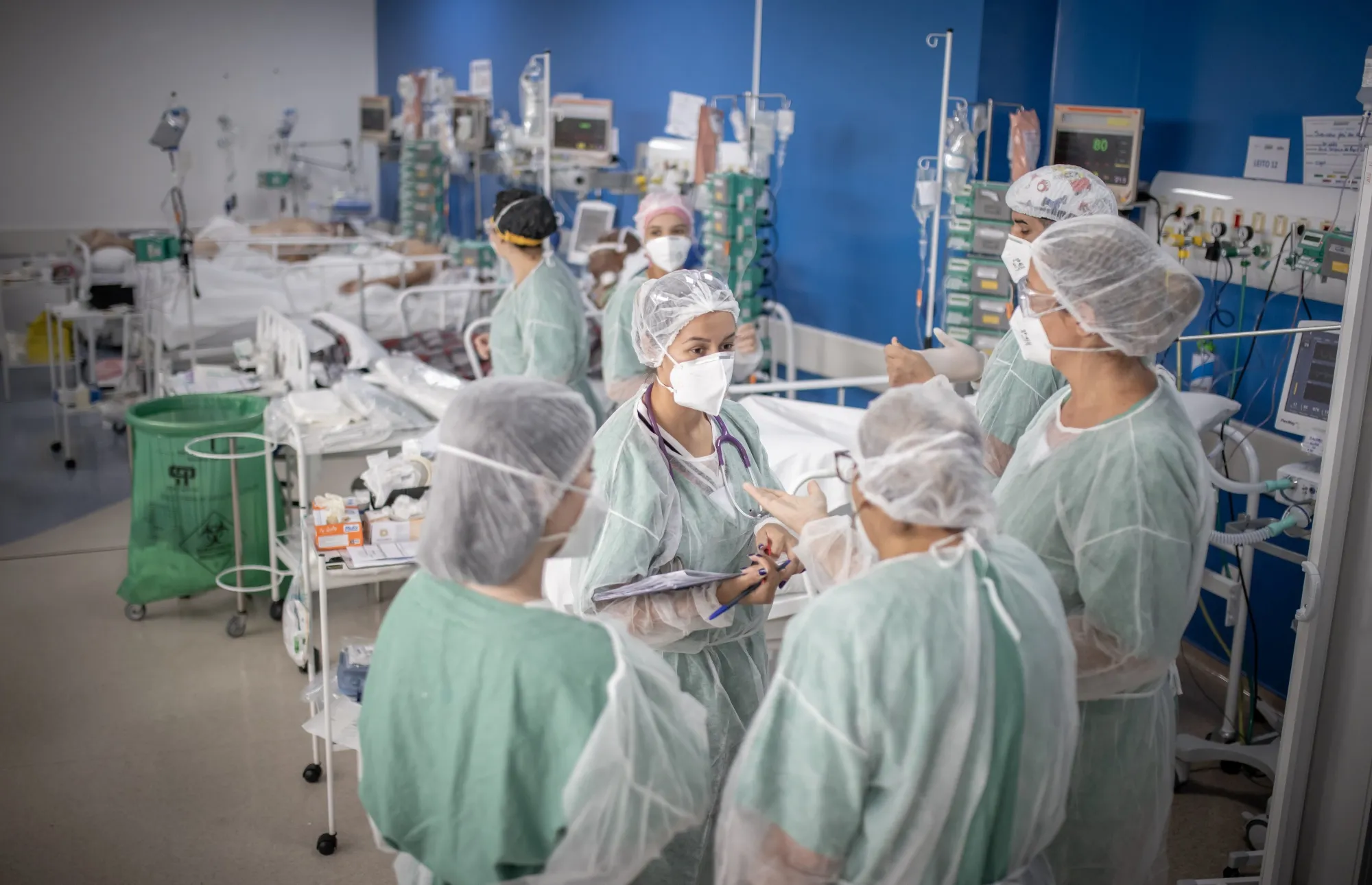 Healthcare workers treat patients inside a Covid-19 ICU ward in Sao Paulo, on March 19.