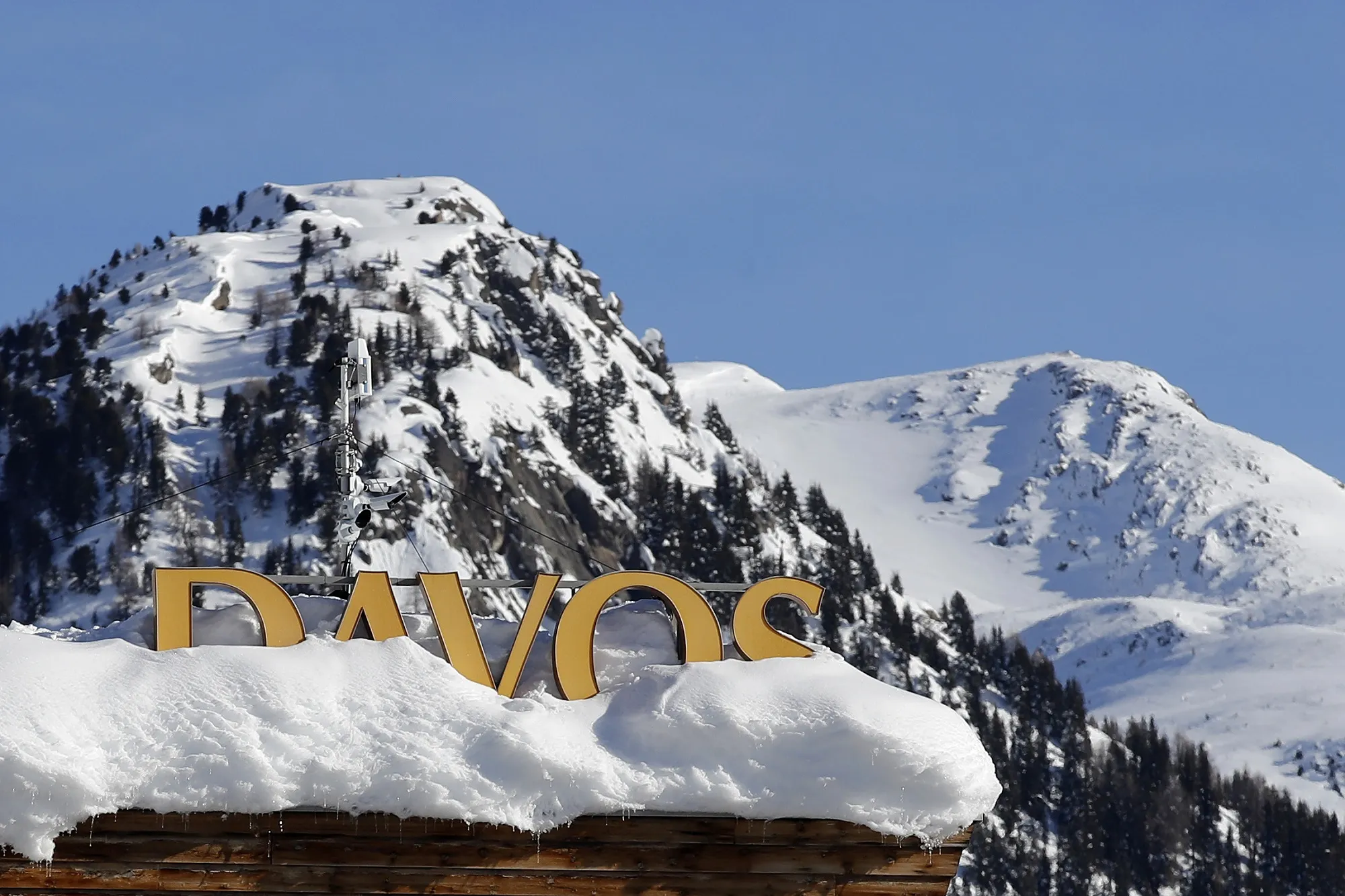 As Davos talks about better governance, the rest of the world talks about 70 percent tax rates.