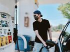 Man Pumps Gas Wearing Protective Face Mask