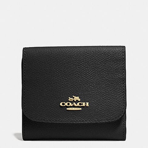 A small Coach wallet in crossgrain leather.