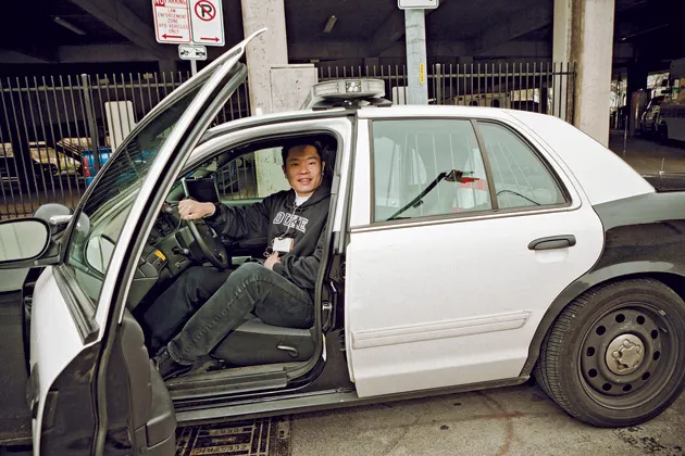 Policemen let Jiang sit in their car
